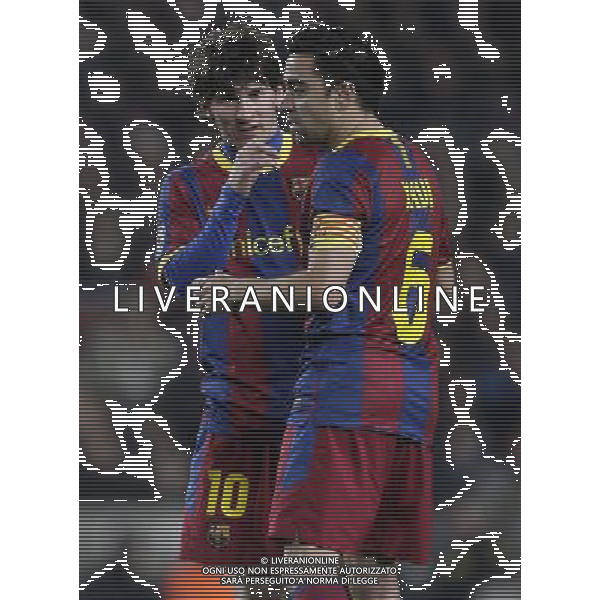 Barcelona\'s players Xavi (right) and Lionel Messi during the UEFA Champions League second round of 16 match between Barcelona FC and Arsenal in the Nou Camp Stadium, Barcelona, Spain, 8 March 2011. AG. ALDO LIVERANI SAS ITALY ONLY *** Local Caption *** .
