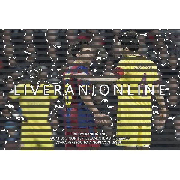 Arsenal\'s Cesc Fabregas (right) talks to Barcelona\'s Xavi Hernàndez during the UEFA Champions League second round of 16 match between Barcelona FC and Arsenal in the Nou Camp Stadium, Barcelona, Spain, 8 March 2011. Barcelona won 3-1. AG. ALDO LIVERANI SAS ITALY ONLY *** Local Caption *** .