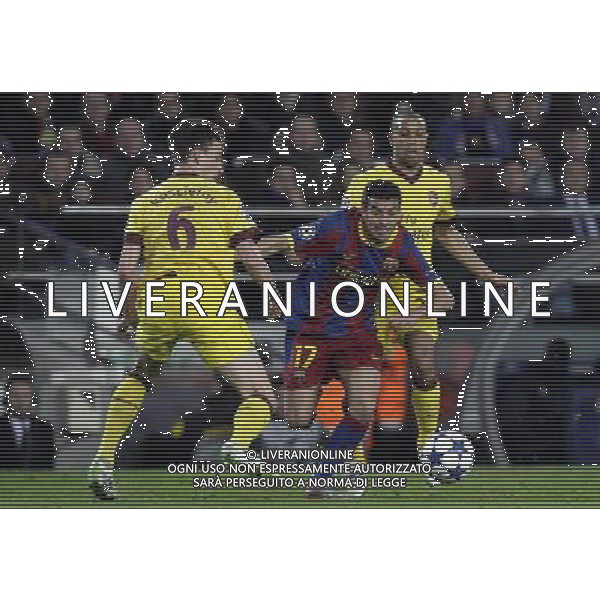 Barcelona\'s Pedro Rodriguez (right) gets past Arsenal\'s Laurent Koscielny during the UEFA Champions League second round of 16 match between Barcelona FC and Arsenal in the Nou Camp Stadium, Barcelona, Spain, 8 March 2011. Barcelona won 3-1. AG. ALDO LIVERANI SAS ITALY ONLY *** Local Caption *** .
