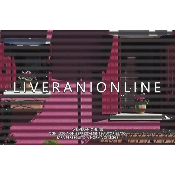 (110309) -- VENICE, March 9, 2011 () -- Photo taken on March 8, 2011 shows part of a brightly-painted house at Burano, an outlying island northeast of Venice, Italy. Villagers of the island have a long tradition to paint their houses colorfully, which today have become the main feature of the island. (/Wang Qingqin) (wjd) Vista della citta\' AG. ALDO LIVERANI SAS ITALY ONLY *** Local Caption *** .