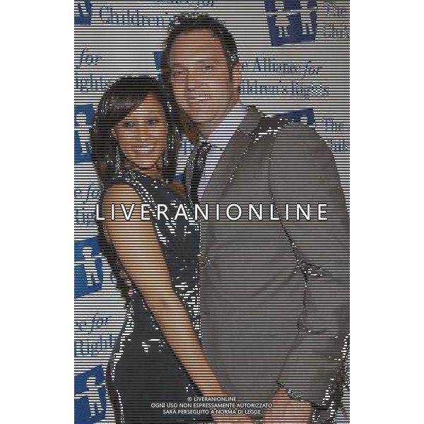 Tamera Mowry and Adam Housley Photo by Janet Gough 18th Annual Alliance For Children\'s Rights Gala at the Beverly Hilton Hotel March 10, 2011 - Beverly Hills, California AG.ALDO LIVERANI SAS ITALY ONLY