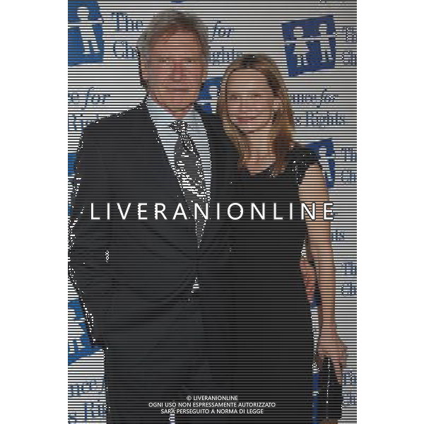 Harrison Ford and wife Calista Flockhart Photo by Janet Gough 18th Annual Alliance For Children\'s Rights Gala at the Beverly Hilton Hotel March 10, 2011 - Beverly Hills, California AG.ALDO LIVERANI SAS ITALY ONLY