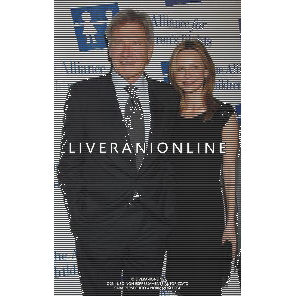 Harrison Ford and wife Calista Flockhart Photo by Janet Gough 18th Annual Alliance For Children\'s Rights Gala at the Beverly Hilton Hotel March 10, 2011 - Beverly Hills, California AG.ALDO LIVERANI SAS ITALY ONLY