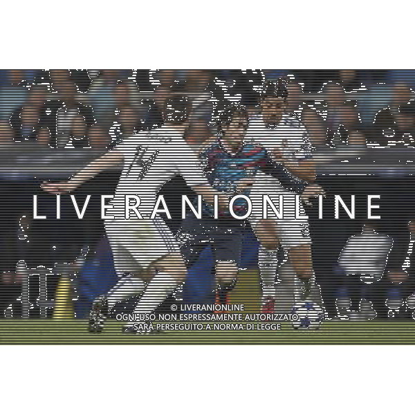 Real Madrid\'s Sami Khedira and Olimpique Lyon\'s Cesar Delgado during Champions League match in Madrid on March 16th 2011. AG ALDO LIVERANI ONLY ITALY