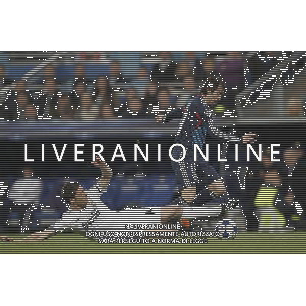 Real Madrid\'s Xabi Alonso and Olimpique Lyon\'s Cesar Delgado during Champions League match in Madrid on March 16th 2011. Photo: Cid-Fuentes / Cebolla / ALFAQUI AG ALDO LIVERANI ONLY ITALY