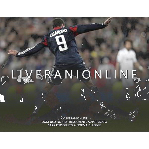 Real Madrid\'s Xabi Alonso and Olimpique Lyon\'s Lisandro during Champions League match in Madrid on March 16th 2011. Photo: Cid-Fuentes / Cebolla / ALFAQUI AG ALDO LIVERANI S A S ONLY ITALY