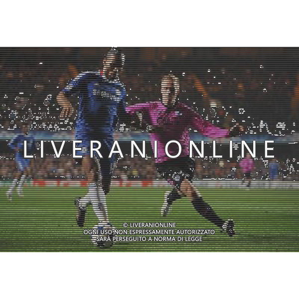 Didier Drogba from Chelsea fights for the ball against Oscar Wendt FC Copenhagen during the UEFA Champions League round of 16 second leg match in London, Great Britain on 16 March 2011. (FACUNDO ARRIZABALAGA) AG ALDO LIVERANI S A S ONLY ITALY