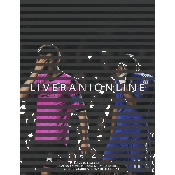 Didier Drogba from Chelsea shows his frustration with William Kvist of FC Copenhagen during the UEFA Champions League round of 16 second leg match in London, Great Britain on 16 March 2011. (FACUNDO ARRIZABALAGA) AG ALDO LIVERANI S A S ONLY ITALY