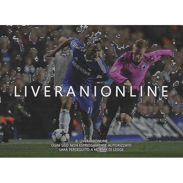 Didier Drogba from Chelsea challenge the ball against Cesar Santin of FC Copenhagen during the UEFA Champions League round of 16 second leg match in London, Great Britain on 16 March 2011. (FACUNDO ARRIZABALAGA) AG ALDO LIVERANI S A S ONLY ITALY