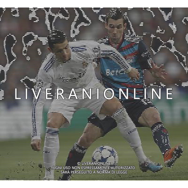 Real Madrid\'s Cristiano Ronaldo and Olimpique Lyon\'s Anthony Reveillere during Champions League match in Madrid on March 16th 2011. Photo: Cid-Fuentes / Cebolla / ALFAQUI AG ALDO LIVERANI S A S ONLY ITALY