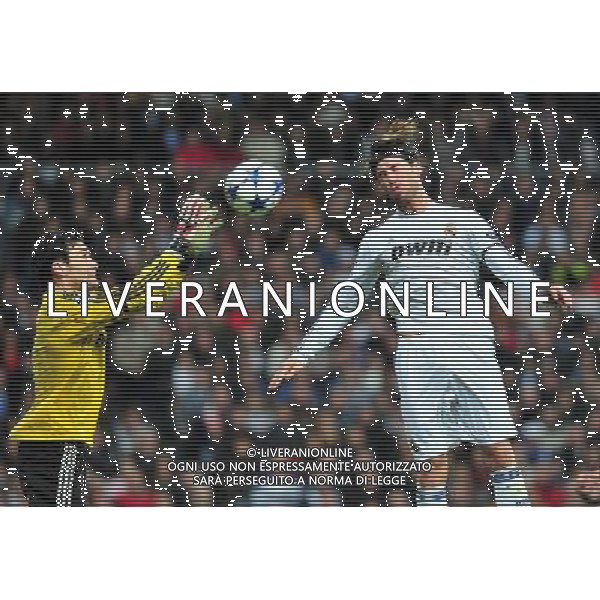 (110317) -- MADRID, March 17, 2011 () -- Sergio Ramos Garcia (R) of Real Madrid competes during the match against Olympique Lyon at the 2010/11 UEFA Champions League at Santiago Bernabeu Stadium in Madrid on March 16, 2011. Madrid defeated Lyon by 3-0. On aggregate 4-1, Real Madrid completed the lineup for quarter finals. (/Chen Haitong) (lm) AG ALDO LIVERANI S A S ONLY ITALY