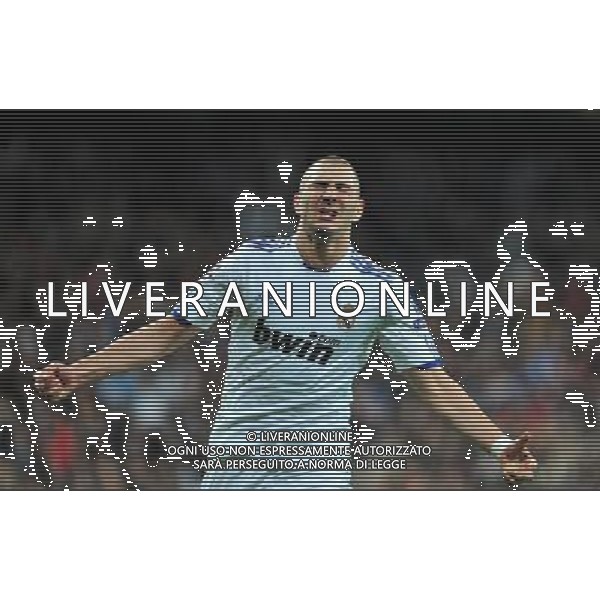 (110317) -- MADRID, March 17, 2011 () -- Karim Benzema of Real Madrid reacts after his goal during the match against Olympique Lyon at the 2010/11 UEFA Champions League at Santiago Bernabeu Stadium in Madrid on March 16, 2011. Madrid defeated Lyon by 3-0. On aggregate 4-1, Real Madrid completed the lineup for quarter finals. (/Chen Haitong) (lm) AG ALDO LIVERANI S A S ONLY ITALY