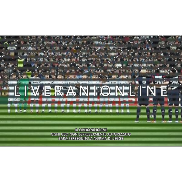 (110317) -- MADRID, March 17, 2011 () -- Players of both teams pay a silent tribute to victims of quake and tsunami in Japan before the match between Real Madrid and Olympique Lyon of UEFA Champions League at Santiago Bernabeu Stadium in Madrid on March 16, 2011. Madrid defeated Lyon by 3-0. On aggregate 4-1, Real Madrid completed the lineup for quarter finals. (/Chen Haitong) (lm) AG ALDO LIVERANI S A S ONLY ITALY