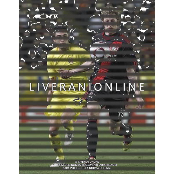 Villareal\'s Bruno Soriano (l) and Bayer 04 Leverkusen\'s Stefan Kiessling during UEFA Europa League match.March 17,2011. (ALTERPHOTOS/Acero) AG. ALDO LIVERANI SAS ITALY ONLY *** Local Caption *** .