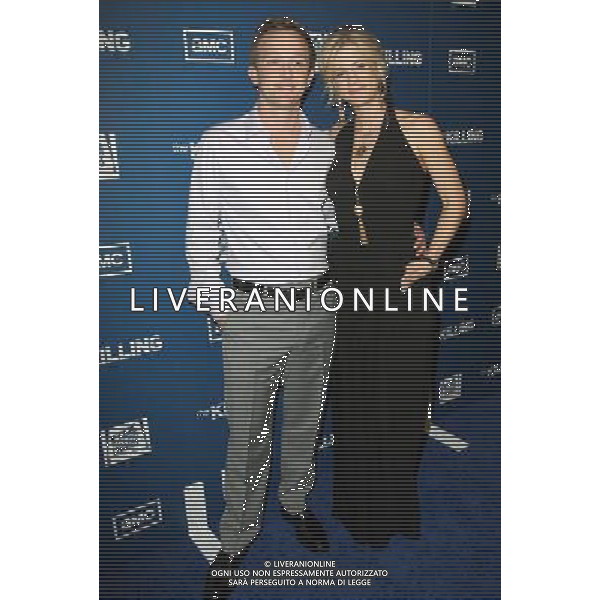 21 March 2011 - Los Angeles, California - Eric Ladin and Guest. Premiere Of AMC\'s Series \'The Killing\'e Held At The Harmony Gold Theatre. Photo Credit: Kevan Brooks/AdMedia AG. ALDO LIVERANI SAS ITALY ONLY *** Local Caption *** .