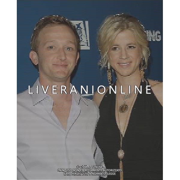 21 March 2011 - Los Angeles, California - Eric Ladin and Guest. Premiere Of AMC\'s Series \'The Killing\'e Held At The Harmony Gold Theatre. Photo Credit: Kevan Brooks/AdMedia AG. ALDO LIVERANI SAS ITALY ONLY *** Local Caption *** .