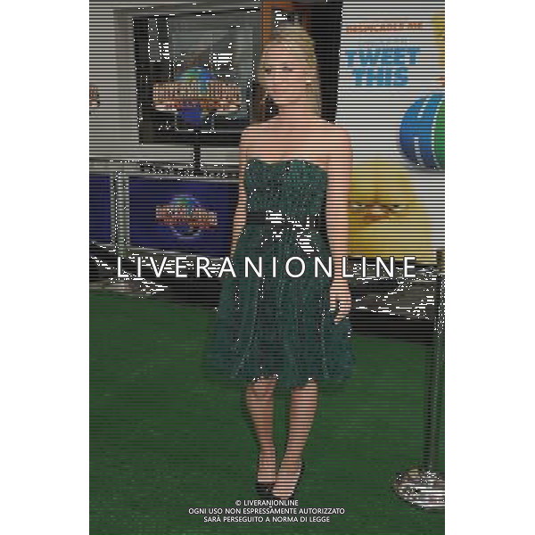 27 March 2011 - Universal City, California - Kaley Cuoco. \'Hop\' Los Angeles Premiere held at Universal CityWalk. Photo Credit: Byron Purvis/AdMedia AG. ALDO LIVERANI SAS ITALY ONLY *** Local Caption *** .
