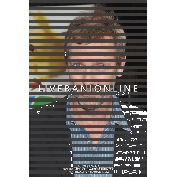 27 March 2011 - Universal City, California - Hugh Laurie. \'Hop\' Los Angeles Premiere held at Universal CityWalk. Photo Credit: Byron Purvis/AdMedia AG. ALDO LIVERANI SAS ITALY ONLY *** Local Caption *** .