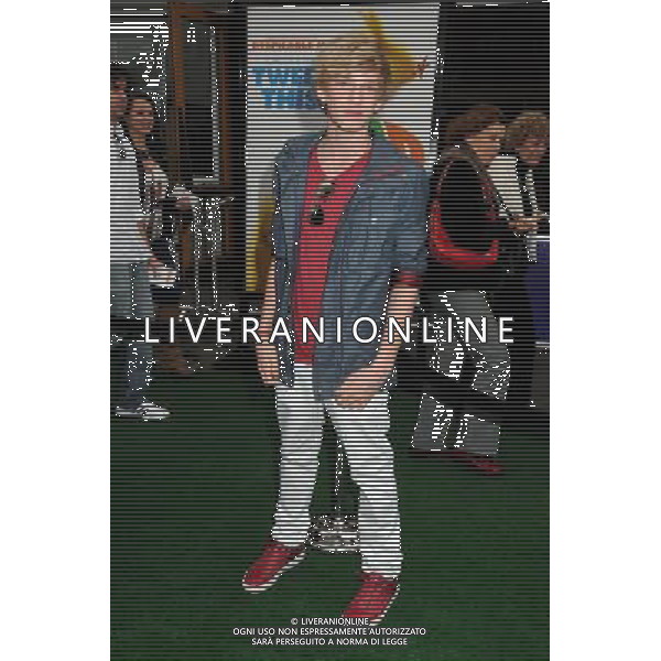 27 March 2011 - Universal City, California - Cody Simpson. \'Hop\' Los Angeles Premiere held at Universal CityWalk. Photo Credit: Byron Purvis/AdMedia AG. ALDO LIVERANI SAS ITALY ONLY *** Local Caption *** .
