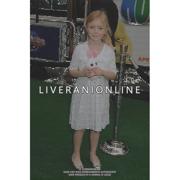 27 March 2011 - Universal City, California - Elsie Fisher. \'Hop\' Los Angeles Premiere held at Universal CityWalk. Photo Credit: Byron Purvis/AdMedia AG. ALDO LIVERANI SAS ITALY ONLY *** Local Caption *** .