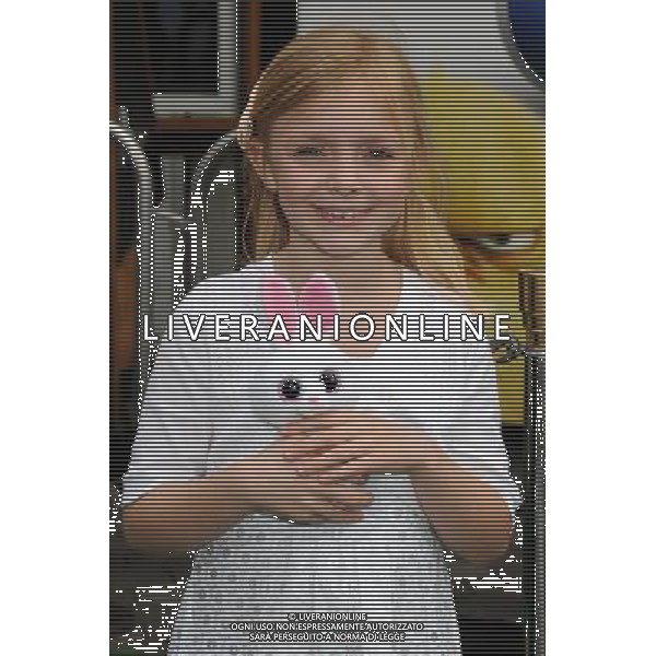 27 March 2011 - Universal City, California - Elsie Fisher. \'Hop\' Los Angeles Premiere held at Universal CityWalk. Photo Credit: Byron Purvis/AdMedia AG. ALDO LIVERANI SAS ITALY ONLY *** Local Caption *** .