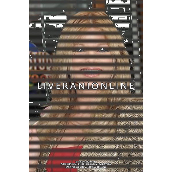 27 March 2011 - Universal City, California - Donna D\'Errico. \'Hop\' Los Angeles Premiere held at Universal CityWalk. Photo Credit: Byron Purvis/AdMedia AG. ALDO LIVERANI SAS ITALY ONLY *** Local Caption *** .
