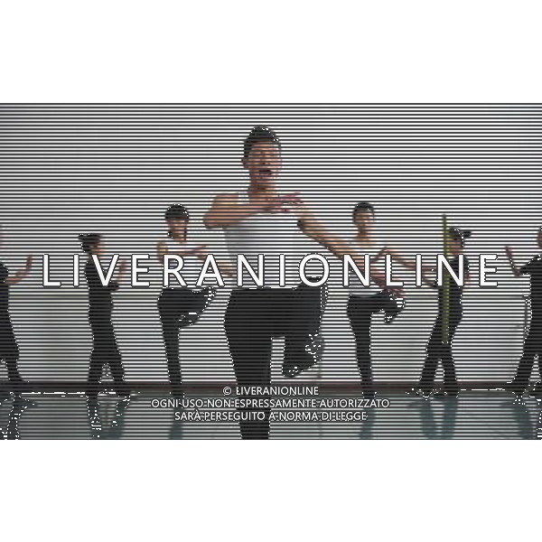 (110403) -- LHASA, April 3, 2011 () -- Students of the Tibetan Opera major have a class in Tibet University in Lhasa, capital of southwest China\'s Tibet Autonomous Region, March 30, 2011. At the School of Arts of Tibet University, there are eighteen Tibetan youth, who are among the first class of undergraduates majoring in Tibetan Opera in China. They are now making unremitting efforts in learning the opera, the time-honored folk art held as \'live fossil of Tibetan culture\'. In 2008, a total of eighteen students from Lhasa, Shigatse, Chamdo and other parts of Tibet Autonomous Region were selected into the undergraduate class of Tibetan Opera Major of Tibet University, the first of its type in China. Today, aged between 17 to 23, these girls and boys are at their third year of college. With three years\' hard training and strict instructions from Tibetan Opera artists, they have made great progresses in all facets from opera singing, dancing to repertoire performances. Wearing the traditional costumes and masks, they dance and sing at the beat of drum and cymbal, with an air of mystery and religious majesty. However, not all of them knew well about Tibetan Opera before entering college. Gongsang Yangzong, 17 years old, was once a hip-hop fan who was just fond of pop culture. She took the major in Tibetan Opera by mere chance. But with the study going further, she has been thoroughly enchanted by this ancient art. \'The Tibetan Opera sets a demanding standard for performers. One must be excellent in both dancing and singing, and also be conversant with Tibetan Culture, religion and history. I am proud of being a Tibetan to inherit the treasure of our people and present it to the world. \' Now, besides the cultural courses, Gongsang Yangzong and other 17 classmates are having six singing classes, ten dancing skill classes and 12 opera or dance repertoire classes every week. Before the birth of the undergraduate class, the School of Arts of Tibetan Un AG. ALDO LIVERANI SAS ITALY ONLY *** Local Caption *** .