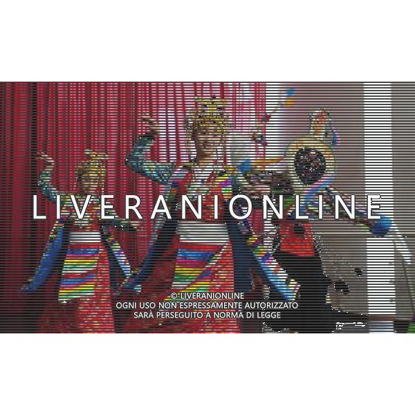 (110403) -- LHASA, April 3, 2011 () -- Students of the Tibetan Opera major have a class in Tibet University in Lhasa, capital of southwest China\'s Tibet Autonomous Region, April 2, 2011. At the School of Arts of Tibet University, there are eighteen Tibetan youth, who are among the first class of undergraduates majoring in Tibetan Opera in China. They are now making unremitting efforts in learning the opera, the time-honored folk art held as \'live fossil of Tibetan culture\'. In 2008, a total of eighteen students from Lhasa, Shigatse, Chamdo and other parts of Tibet Autonomous Region were selected into the undergraduate class of Tibetan Opera Major of Tibet University, the first of its type in China. Today, aged between 17 to 23, these girls and boys are at their third year of college. With three years\' hard training and strict instructions from Tibetan Opera artists, they have made great progresses in all facets from opera singing, dancing to repertoire performances. Wearing the traditional costumes and masks, they dance and sing at the beat of drum and cymbal, with an air of mystery and religious majesty. However, not all of them knew well about Tibetan Opera before entering college. Gongsang Yangzong, 17 years old, was once a hip-hop fan who was just fond of pop culture. She took the major in Tibetan Opera by mere chance. But with the study going further, she has been thoroughly enchanted by this ancient art. \'The Tibetan Opera sets a demanding standard for performers. One must be excellent in both dancing and singing, and also be conversant with Tibetan Culture, religion and history. I am proud of being a Tibetan to inherit the treasure of our people and present it to the world. \' Now, besides the cultural courses, Gongsang Yangzong and other 17 classmates are having six singing classes, ten dancing skill classes and 12 opera or dance repertoire classes every week. Before the birth of the undergraduate class, the School of Arts of Tibetan Uni AG. ALDO LIVERANI SAS ITALY ONLY *** Local Caption *** .