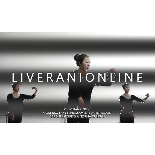 (110403) -- LHASA, April 3, 2011 () -- Students of the Tibetan Opera major have a class in Tibet University in Lhasa, capital of southwest China\'s Tibet Autonomous Region, March 30, 2011. At the School of Arts of Tibet University, there are eighteen Tibetan youth, who are among the first class of undergraduates majoring in Tibetan Opera in China. They are now making unremitting efforts in learning the opera, the time-honored folk art held as \'live fossil of Tibetan culture\'. In 2008, a total of eighteen students from Lhasa, Shigatse, Chamdo and other parts of Tibet Autonomous Region were selected into the undergraduate class of Tibetan Opera Major of Tibet University, the first of its type in China. Today, aged between 17 to 23, these girls and boys are at their third year of college. With three years\' hard training and strict instructions from Tibetan Opera artists, they have made great progresses in all facets from opera singing, dancing to repertoire performances. Wearing the traditional costumes and masks, they dance and sing at the beat of drum and cymbal, with an air of mystery and religious majesty. However, not all of them knew well about Tibetan Opera before entering college. Gongsang Yangzong, 17 years old, was once a hip-hop fan who was just fond of pop culture. She took the major in Tibetan Opera by mere chance. But with the study going further, she has been thoroughly enchanted by this ancient art. \'The Tibetan Opera sets a demanding standard for performers. One must be excellent in both dancing and singing, and also be conversant with Tibetan Culture, religion and history. I am proud of being a Tibetan to inherit the treasure of our people and present it to the world. \' Now, besides the cultural courses, Gongsang Yangzong and other 17 classmates are having six singing classes, ten dancing skill classes and 12 opera or dance repertoire classes every week. Before the birth of the undergraduate class, the School of Arts of Tibetan Un AG. ALDO LIVERANI SAS ITALY ONLY *** Local Caption *** .