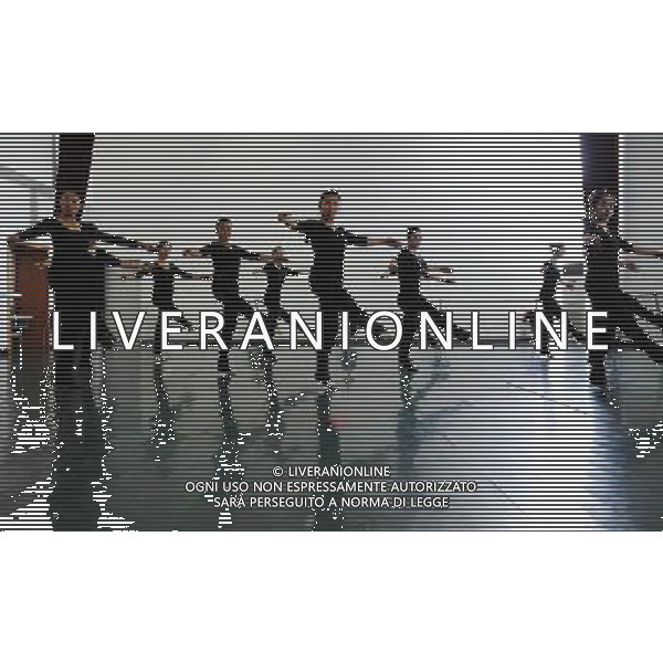 (110403) -- LHASA, April 3, 2011 () -- Students of the Tibetan Opera major have a class in Tibet University in Lhasa, capital of southwest China\'s Tibet Autonomous Region, March 30, 2011. At the School of Arts of Tibet University, there are eighteen Tibetan youth, who are among the first class of undergraduates majoring in Tibetan Opera in China. They are now making unremitting efforts in learning the opera, the time-honored folk art held as \'live fossil of Tibetan culture\'. In 2008, a total of eighteen students from Lhasa, Shigatse, Chamdo and other parts of Tibet Autonomous Region were selected into the undergraduate class of Tibetan Opera Major of Tibet University, the first of its type in China. Today, aged between 17 to 23, these girls and boys are at their third year of college. With three years\' hard training and strict instructions from Tibetan Opera artists, they have made great progresses in all facets from opera singing, dancing to repertoire performances. Wearing the traditional costumes and masks, they dance and sing at the beat of drum and cymbal, with an air of mystery and religious majesty. However, not all of them knew well about Tibetan Opera before entering college. Gongsang Yangzong, 17 years old, was once a hip-hop fan who was just fond of pop culture. She took the major in Tibetan Opera by mere chance. But with the study going further, she has been thoroughly enchanted by this ancient art. \'The Tibetan Opera sets a demanding standard for performers. One must be excellent in both dancing and singing, and also be conversant with Tibetan Culture, religion and history. I am proud of being a Tibetan to inherit the treasure of our people and present it to the world. \' Now, besides the cultural courses, Gongsang Yangzong and other 17 classmates are having six singing classes, ten dancing skill classes and 12 opera or dance repertoire classes every week. Before the birth of the undergraduate class, the School of Arts of Tibetan Un AG. ALDO LIVERANI SAS ITALY ONLY *** Local Caption *** .