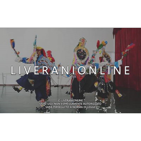 (110403) -- LHASA, April 3, 2011 () -- Students of the Tibetan Opera major have a class in Tibet University in Lhasa, capital of southwest China\'s Tibet Autonomous Region, April 2, 2011. At the School of Arts of Tibet University, there are eighteen Tibetan youth, who are among the first class of undergraduates majoring in Tibetan Opera in China. They are now making unremitting efforts in learning the opera, the time-honored folk art held as \'live fossil of Tibetan culture\'. In 2008, a total of eighteen students from Lhasa, Shigatse, Chamdo and other parts of Tibet Autonomous Region were selected into the undergraduate class of Tibetan Opera Major of Tibet University, the first of its type in China. Today, aged between 17 to 23, these girls and boys are at their third year of college. With three years\' hard training and strict instructions from Tibetan Opera artists, they have made great progresses in all facets from opera singing, dancing to repertoire performances. Wearing the traditional costumes and masks, they dance and sing at the beat of drum and cymbal, with an air of mystery and religious majesty. However, not all of them knew well about Tibetan Opera before entering college. Gongsang Yangzong, 17 years old, was once a hip-hop fan who was just fond of pop culture. She took the major in Tibetan Opera by mere chance. But with the study going further, she has been thoroughly enchanted by this ancient art. \'The Tibetan Opera sets a demanding standard for performers. One must be excellent in both dancing and singing, and also be conversant with Tibetan Culture, religion and history. I am proud of being a Tibetan to inherit the treasure of our people and present it to the world. \' Now, besides the cultural courses, Gongsang Yangzong and other 17 classmates are having six singing classes, ten dancing skill classes and 12 opera or dance repertoire classes every week. Before the birth of the undergraduate class, the School of Arts of Tibetan Uni AG. ALDO LIVERANI SAS ITALY ONLY *** Local Caption *** .