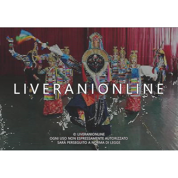 (110403) -- LHASA, April 3, 2011 () -- Students of the Tibetan Opera major have a class in Tibet University in Lhasa, capital of southwest China\'s Tibet Autonomous Region, April 2, 2011. At the School of Arts of Tibet University, there are eighteen Tibetan youth, who are among the first class of undergraduates majoring in Tibetan Opera in China. They are now making unremitting efforts in learning the opera, the time-honored folk art held as \'live fossil of Tibetan culture\'. In 2008, a total of eighteen students from Lhasa, Shigatse, Chamdo and other parts of Tibet Autonomous Region were selected into the undergraduate class of Tibetan Opera Major of Tibet University, the first of its type in China. Today, aged between 17 to 23, these girls and boys are at their third year of college. With three years\' hard training and strict instructions from Tibetan Opera artists, they have made great progresses in all facets from opera singing, dancing to repertoire performances. Wearing the traditional costumes and masks, they dance and sing at the beat of drum and cymbal, with an air of mystery and religious majesty. However, not all of them knew well about Tibetan Opera before entering college. Gongsang Yangzong, 17 years old, was once a hip-hop fan who was just fond of pop culture. She took the major in Tibetan Opera by mere chance. But with the study going further, she has been thoroughly enchanted by this ancient art. \'The Tibetan Opera sets a demanding standard for performers. One must be excellent in both dancing and singing, and also be conversant with Tibetan Culture, religion and history. I am proud of being a Tibetan to inherit the treasure of our people and present it to the world. \' Now, besides the cultural courses, Gongsang Yangzong and other 17 classmates are having six singing classes, ten dancing skill classes and 12 opera or dance repertoire classes every week. Before the birth of the undergraduate class, the School of Arts of Tibetan Uni AG. ALDO LIVERANI SAS ITALY ONLY *** Local Caption *** .