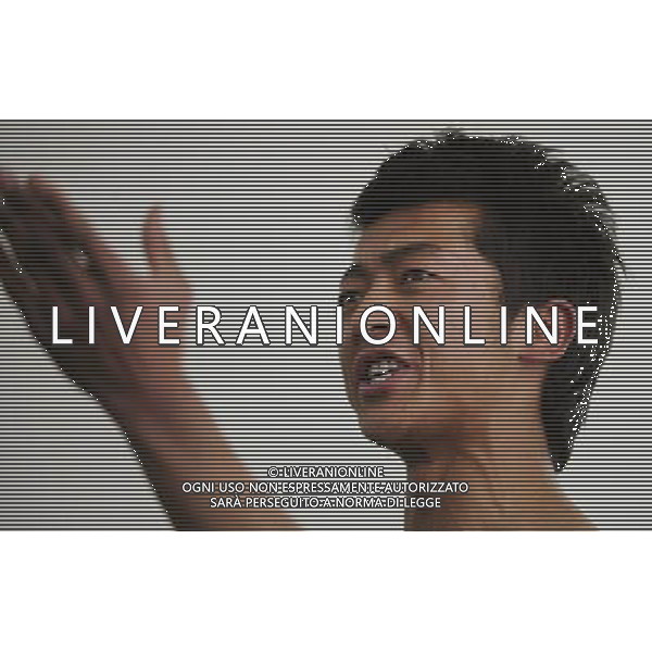 (110403) -- LHASA, April 3, 2011 () -- Basang Qu of the Tibetan Opera major has a class in Tibet University in Lhasa, capital of southwest China\'s Tibet Autonomous Region, March 30, 2011. At the School of Arts of Tibet University, there are eighteen Tibetan youth, who are among the first class of undergraduates majoring in Tibetan Opera in China. They are now making unremitting efforts in learning the opera, the time-honored folk art held as \'live fossil of Tibetan culture\'. In 2008, a total of eighteen students from Lhasa, Shigatse, Chamdo and other parts of Tibet Autonomous Region were selected into the undergraduate class of Tibetan Opera Major of Tibet University, the first of its type in China. Today, aged between 17 to 23, these girls and boys are at their third year of college. With three years\' hard training and strict instructions from Tibetan Opera artists, they have made great progresses in all facets from opera singing, dancing to repertoire performances. Wearing the traditional costumes and masks, they dance and sing at the beat of drum and cymbal, with an air of mystery and religious majesty. However, not all of them knew well about Tibetan Opera before entering college. Gongsang Yangzong, 17 years old, was once a hip-hop fan who was just fond of pop culture. She took the major in Tibetan Opera by mere chance. But with the study going further, she has been thoroughly enchanted by this ancient art. \'The Tibetan Opera sets a demanding standard for performers. One must be excellent in both dancing and singing, and also be conversant with Tibetan Culture, religion and history. I am proud of being a Tibetan to inherit the treasure of our people and present it to the world. \' Now, besides the cultural courses, Gongsang Yangzong and other 17 classmates are having six singing classes, ten dancing skill classes and 12 opera or dance repertoire classes every week. Before the birth of the undergraduate class, the School of Arts of Tibetan Un AG. ALDO LIVERANI SAS ITALY ONLY *** Local Caption *** .