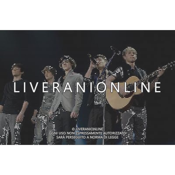 - Picture Shows: One Direction performing live at the matinŽe show as part of the X Factor UK Live Tour 2011 at the SECC, Glasgow Scotland, UK -2nd April 2011. AG. ALDO LIVERANI SAS ITALY ONLY *** Local Caption *** .