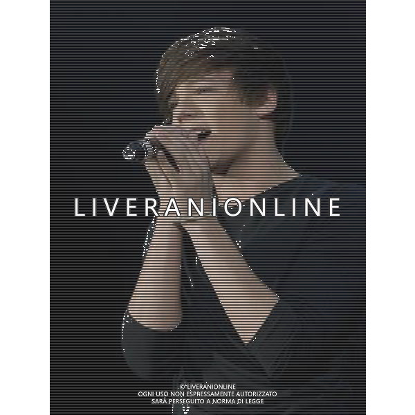 - Picture Shows: One Direction performing live at the matinŽe show as part of the X Factor UK Live Tour 2011 at the SECC, Glasgow Scotland, UK -2nd April 2011. AG. ALDO LIVERANI SAS ITALY ONLY *** Local Caption *** .