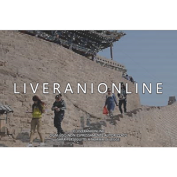 JIEXIU, April 4, 2011 People tour around Qikou Town in Jiexiu, north China\'s Shanxi province, April 3, 2011, the first day of the Tomb Sweeping holiday. (/Yu Zhenhai) (zym) AG. ALDO LIVERANI SAS ITALY ONLY *** Local Caption *** .