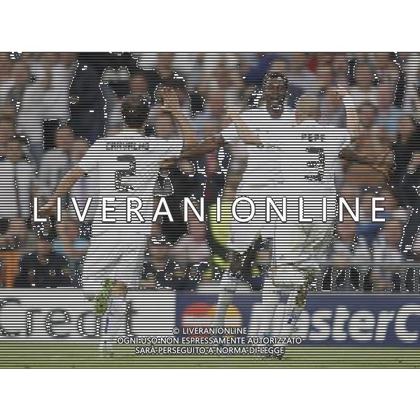 Real Madrid\'s Emmanuel Adebayor celebrates with Pepe and Ricardo Carvalho during Champions League Match. April 05, 2011. (ALTERPHOTOS/Alvaro Hernandez) MADRID 05/04/2011 4 DI FINALE CHAMPIONS LEAGUE REAL MADRID-TOTTENHAM AG ALDO LIVERANI ONLY ITALY