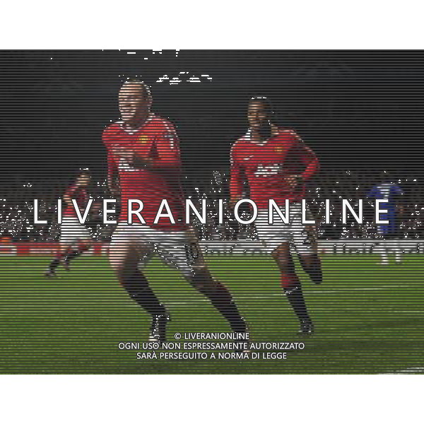 (110407) -- LONDON, April 7, 2011 () -- Wayne Rooney (L) of Manchester United celebrates for his goal during the first leg match of the 2010/11 UEFA Champions League quarter-finals against Chelsea at Stamford Bridge in London, Britain, April 6, 2011. Manchester United won by 1-0. (/Zeng Yi) ©PHOTOSHOT/AGENZIA ALDO LIVERANI SAS - ITALY ONLY - EDITORIAL USE ONLY - CHELSEA - MANCHESTER UNITED ANDATA QUARTI DI FINALE DI CHAMPIONS LEAGUE 06/04/2011