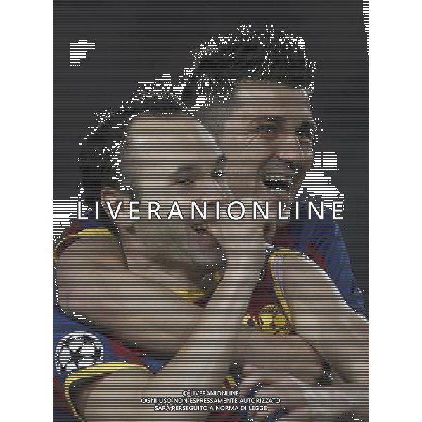 Barcelona\'s Iniesta (goal) and David Villa during Champions League match on April, 6th 2011. Photo: Cesar Cebolla / ALFAQUI /ALDO LIVERANI CHAMPIONS LEAGUE BARCELLONA - FC Shakhtar Donetsk ANDATA DEI QUARTI DI FINALE - ITALY ONLY - *** Local Caption *** .