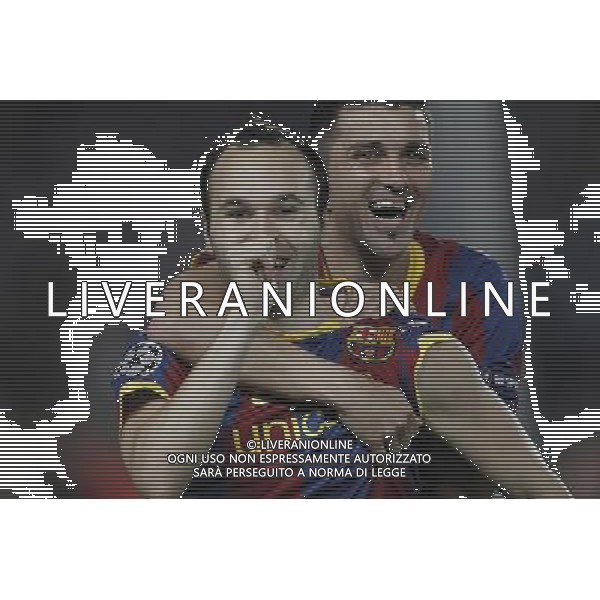 Barcelona\'s Iniesta (goal) and David Villa during Champions League match on April, 6th 2011. Photo: Cesar Cebolla / ALFAQUI /ALDO LIVERANI CHAMPIONS LEAGUE BARCELLONA - FC Shakhtar Donetsk ANDATA DEI QUARTI DI FINALE - ITALY ONLY - *** Local Caption *** .
