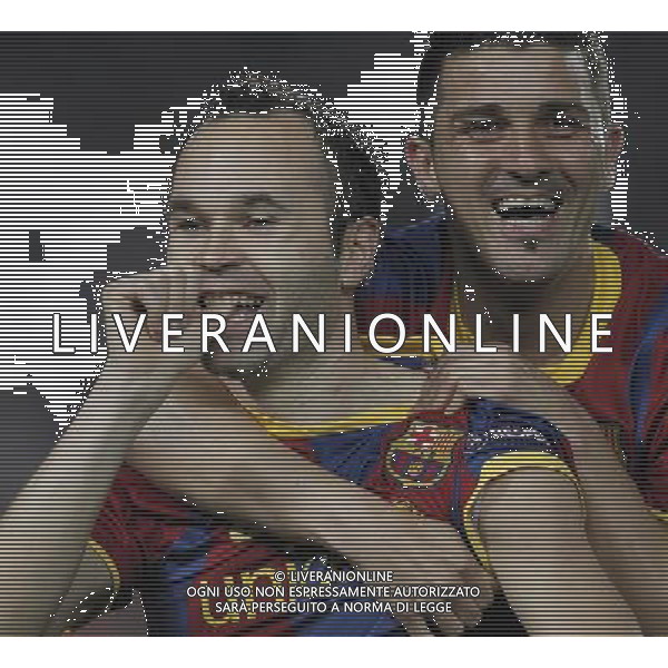 Barcelona\'s Iniesta (goal) and David Villa during Champions League match on April, 6th 2011. Photo: Cesar Cebolla / ALFAQUI /ALDO LIVERANI CHAMPIONS LEAGUE BARCELLONA - FC Shakhtar Donetsk ANDATA DEI QUARTI DI FINALE - ITALY ONLY - *** Local Caption *** .