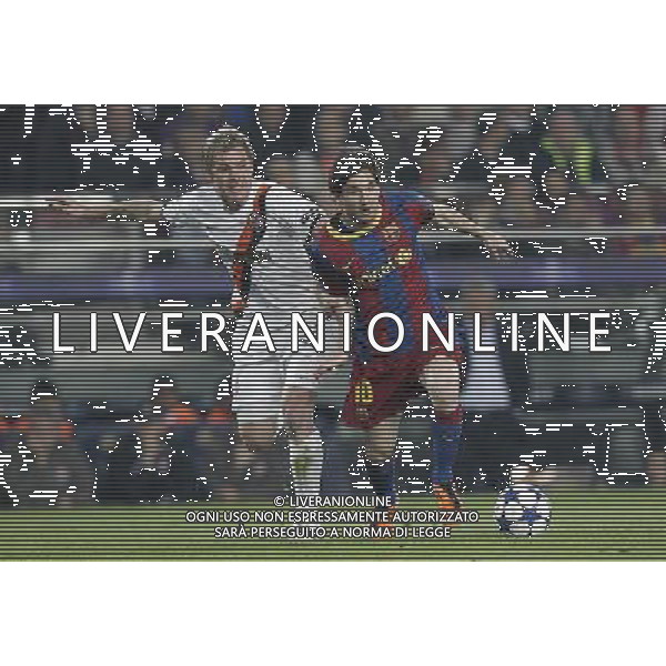 Barcelona\'s Lionel Messi and Shaktar Donetsk\'s Tomas Hubschman during Champions League match on April, 6th 2011. Photo: Cesar Cebolla / ALFAQUI /ALDO LIVERANI CHAMPIONS LEAGUE BARCELLONA - FC Shakhtar Donetsk ANDATA DEI QUARTI DI FINALE - ITALY ONLY - *** Local Caption *** .