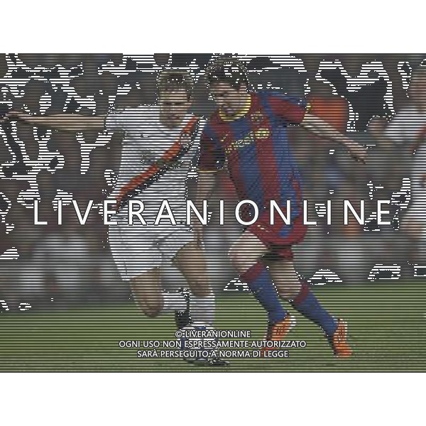 Barcelona\'s Lionel Messi and Shaktar Donetsk\'s Mykola Isshchenko during Champions League match on April, 6th 2011. Photo: Cesar Cebolla / ALFAQUI /ALDO LIVERANI CHAMPIONS LEAGUE BARCELLONA - FC Shakhtar Donetsk ANDATA DEI QUARTI DI FINALE - ITALY ONLY - *** Local Caption *** .