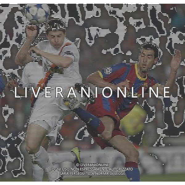 Barcelona\'s Sergio Busquets and Shaktar Donetsk\'s during Champions League match on April, 6th 2011. Photo: Cesar Cebolla / ALFAQUI /ALDO LIVERANI CHAMPIONS LEAGUE BARCELLONA - FC Shakhtar Donetsk ANDATA DEI QUARTI DI FINALE - ITALY ONLY - *** Local Caption *** .