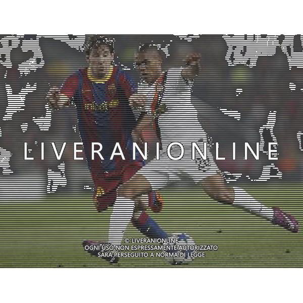 Barcelona\'s Lionel Messi and Shaktar Donetsk\'s Douglas Costa during Champions League match on April, 6th 2011. Photo: Cesar Cebolla / ALFAQUI /ALDO LIVERANI CHAMPIONS LEAGUE BARCELLONA - FC Shakhtar Donetsk ANDATA DEI QUARTI DI FINALE - ITALY ONLY - *** Local Caption *** .