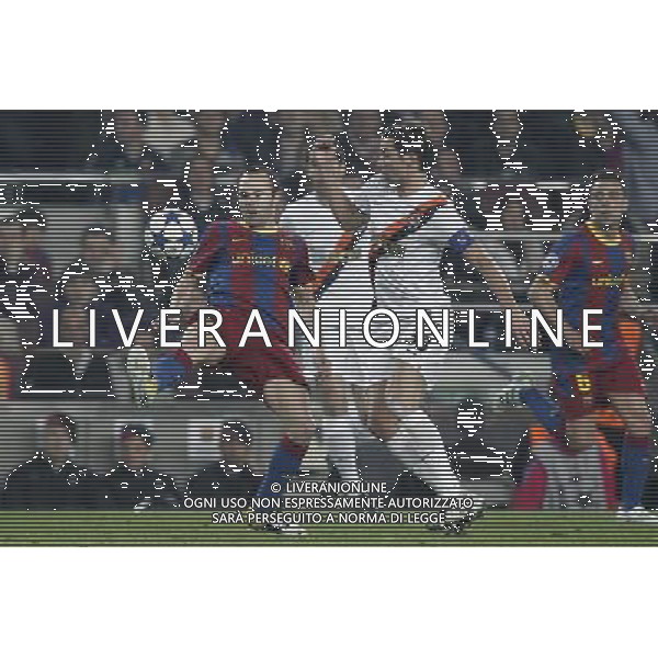 Barcelona\'s Andres Iniesta and Shaktar Donetsk\'s Darijo Srna during Champions League match on April, 6th 2011. Photo: Cesar Cebolla / ALFAQUI /ALDO LIVERANI CHAMPIONS LEAGUE BARCELLONA - FC Shakhtar Donetsk ANDATA DEI QUARTI DI FINALE - ITALY ONLY - *** Local Caption *** .