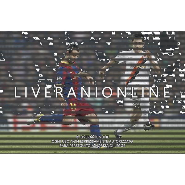 Barcelona\'s Javier Mascherano and Shaktar Donetsk\'s Henryk Mkhitaryan during Champions League match on April, 6th 2011. Photo: Cesar Cebolla / ALFAQUI /ALDO LIVERANI CHAMPIONS LEAGUE BARCELLONA - FC Shakhtar Donetsk ANDATA DEI QUARTI DI FINALE - ITALY ONLY - *** Local Caption *** .