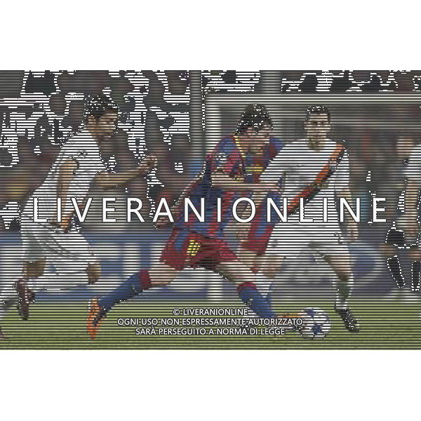 Barcelona\'s Lionel Messi and Shaktar Donetsk\'s Henryk Mkhitaryan during Champions League match on April, 6th 2011. Photo: Cesar Cebolla / ALFAQUI /ALDO LIVERANI CHAMPIONS LEAGUE BARCELLONA - FC Shakhtar Donetsk ANDATA DEI QUARTI DI FINALE - ITALY ONLY - *** Local Caption *** .