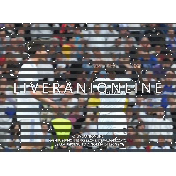 MADRID, April 6, 2011 () Real Madrid\'s Emmanuel Adebayor (R) celebrates after scoring during the first match of the 2010/11 UEFA Champions League quarter final against Tottenham Hotspur at Santiago Bernabeu Stadium in Madrid on April 6, 2011. Real Madrid won 4 0. (/Chen Haitong)(bxf) UEFA Champions League 2010/11 Quarti di finale Real Madrid vs Tottenham AG. ALDO LIVERANI SAS ITALY ONLY *** Local Caption *** .