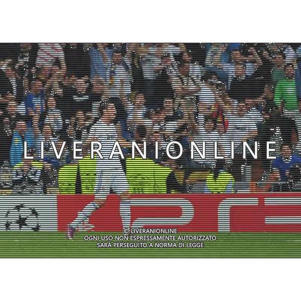 MADRID, April 6, 2011 () Real Madrid\'s Cristiano Ronaldo celebrates after scoring during the first match of the 2010/11 UEFA Champions League quarter final against Tottenham Hotspur at Santiago Bernabeu Stadium in Madrid on April 6, 2011. Real Madrid won 4 0. (/Chen Haitong)(bxf) UEFA Champions League 2010/11 Quarti di finale Real Madrid vs Tottenham AG. ALDO LIVERANI SAS ITALY ONLY *** Local Caption *** .